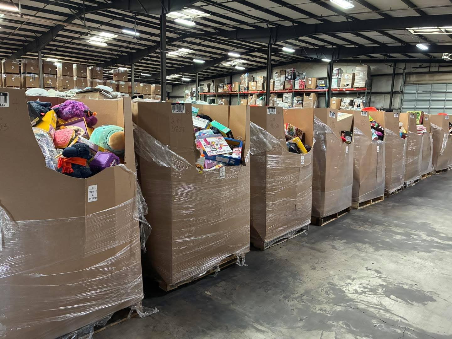 Wholesale liquidation bins inside a warehouse
