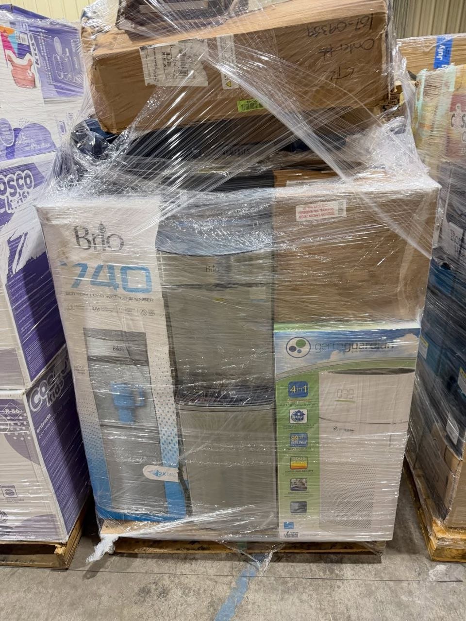 Assorted boxed appliances and general merchandise on a wrapped pallet