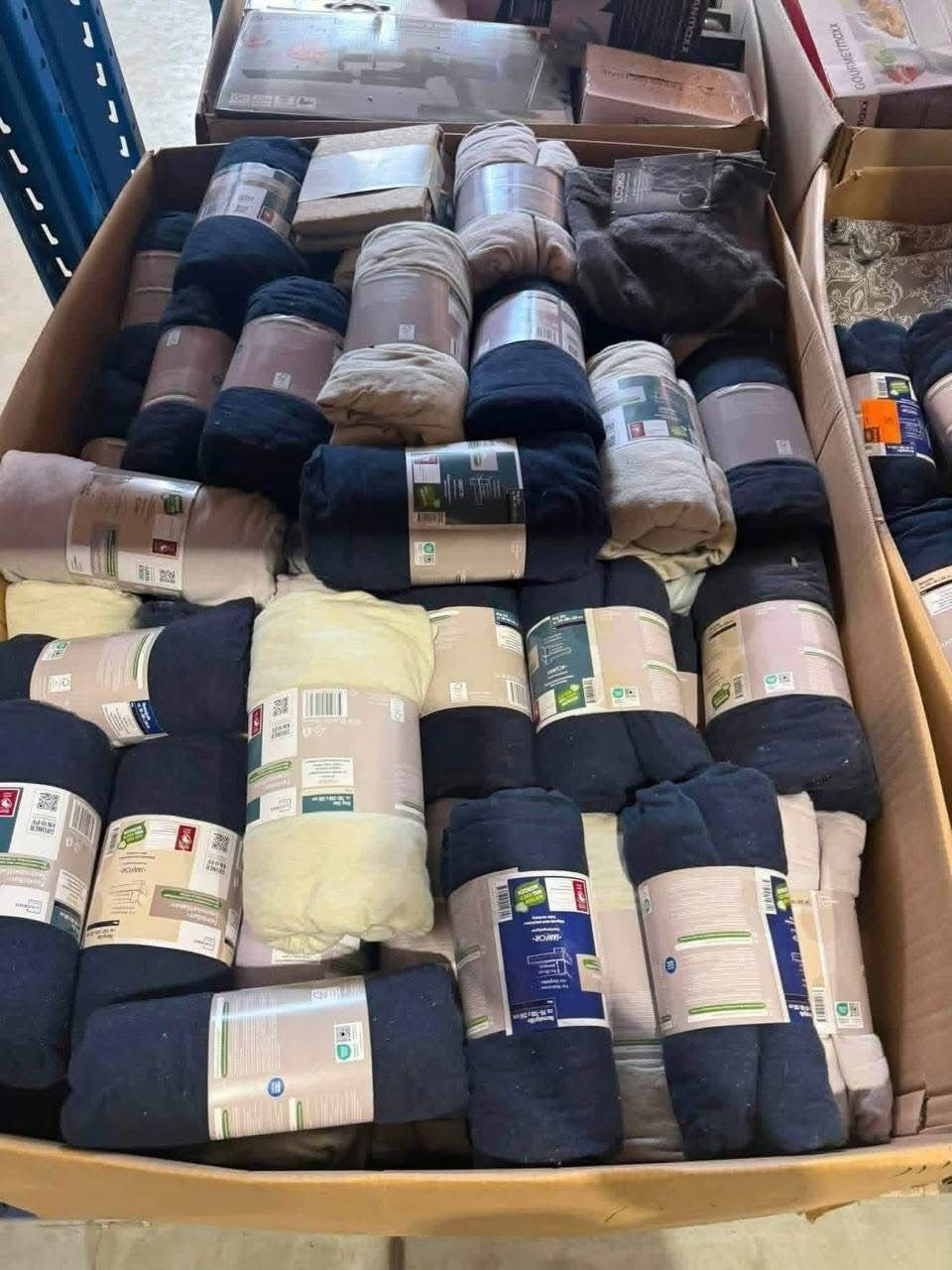 Bulk pallet of packaged blankets fleece throws and winter home textiles
