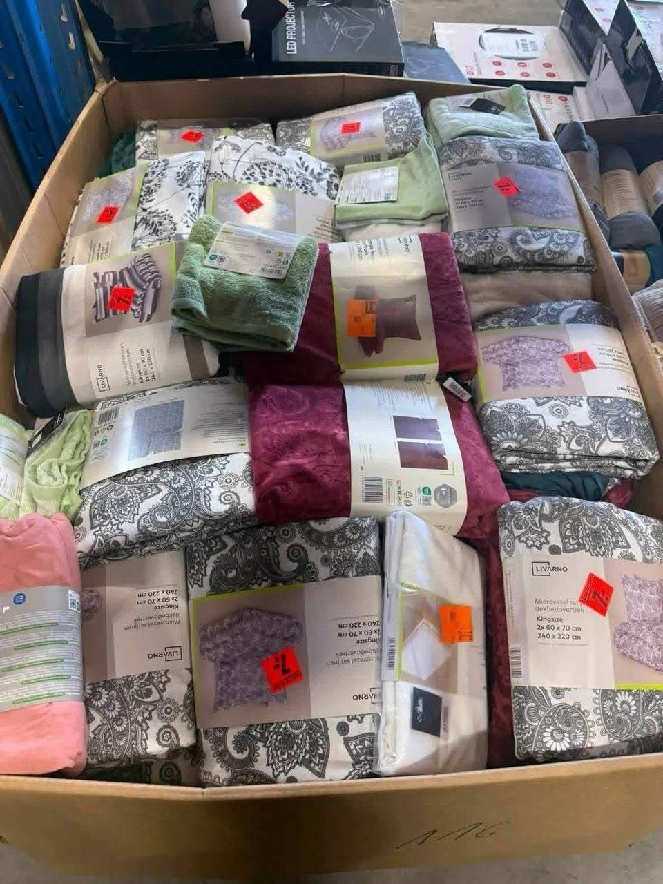 Mixed pallet box with new packaged bedding linens and home textiles
