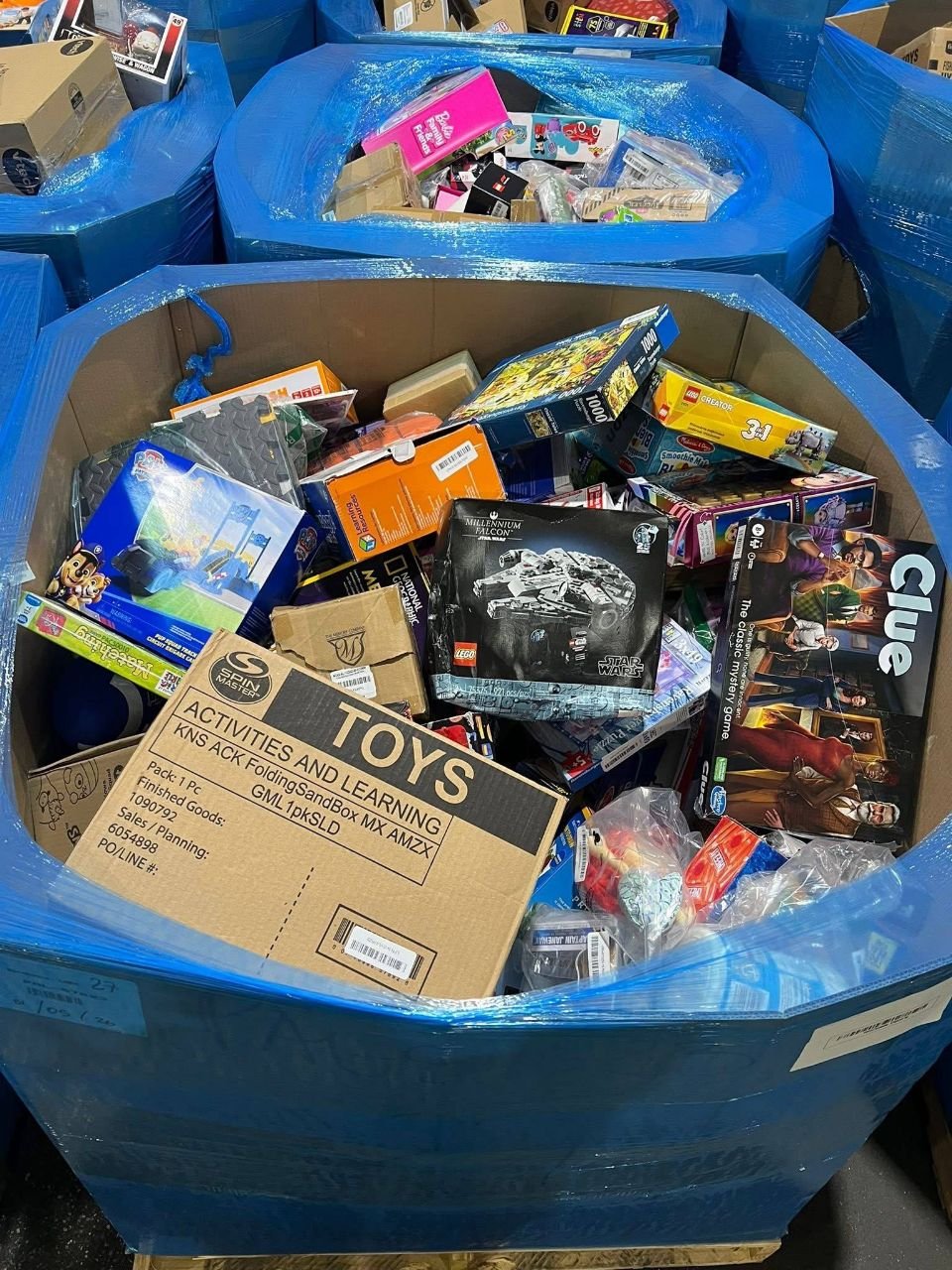 Wholesale toy liquidation assortment with puzzles LEGO sets and assorted boxed games