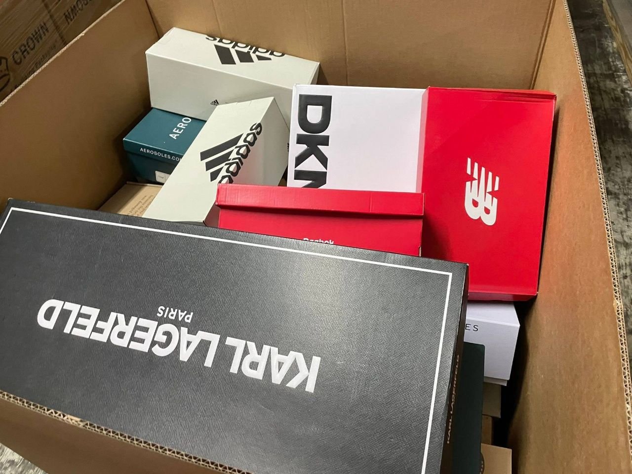 Mixed brand shoe box pallet with adidas New Balance DKNY and Karl Lagerfeld shoe boxes