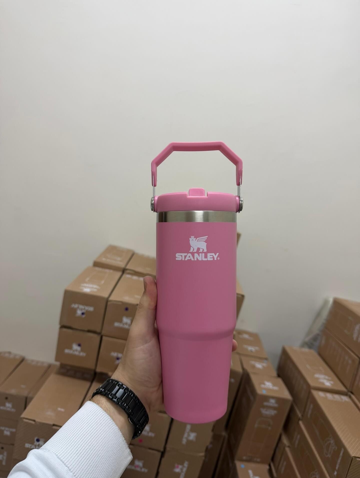 Pink Stanley Quencher H2.0 30oz insulated tumbler with folding handle