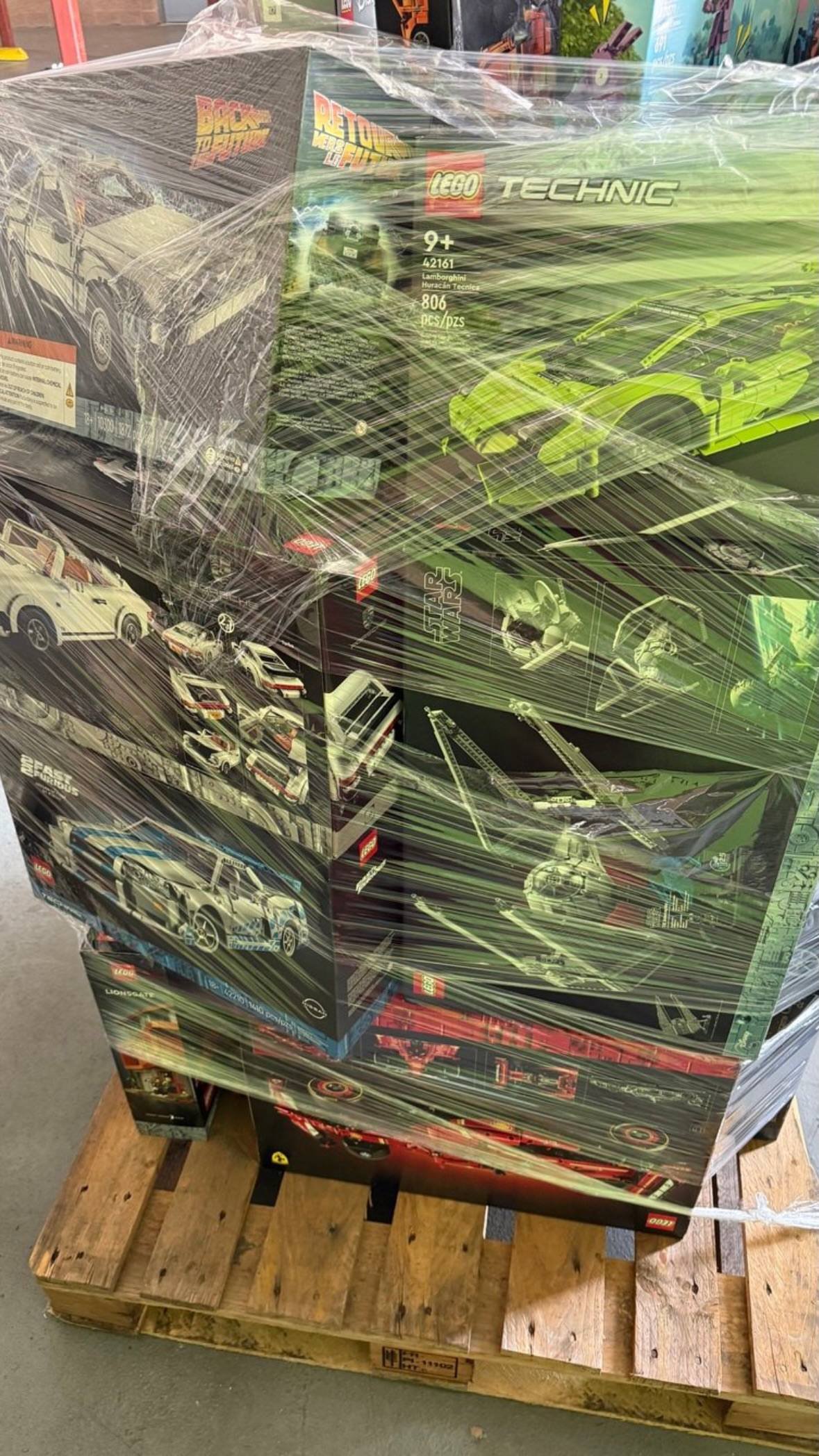 Wrapped pallet of LEGO building sets ready for wholesale freight shipping