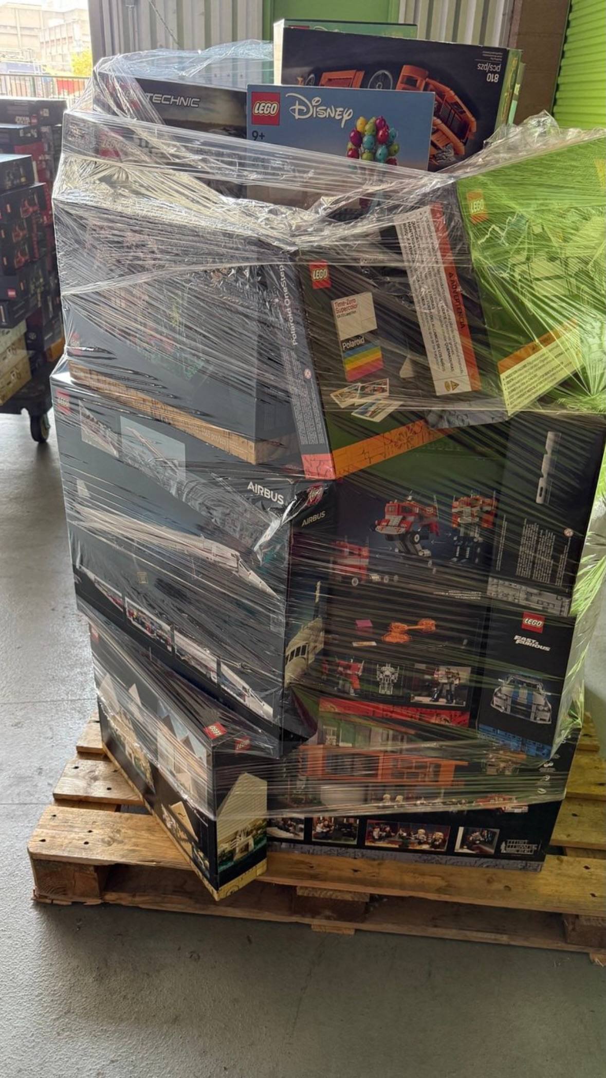 Wrapped LEGO wholesale pallet with LEGO Disney Technic and other boxed building sets